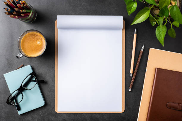 istock white paper with clipboard on black background 1144145000