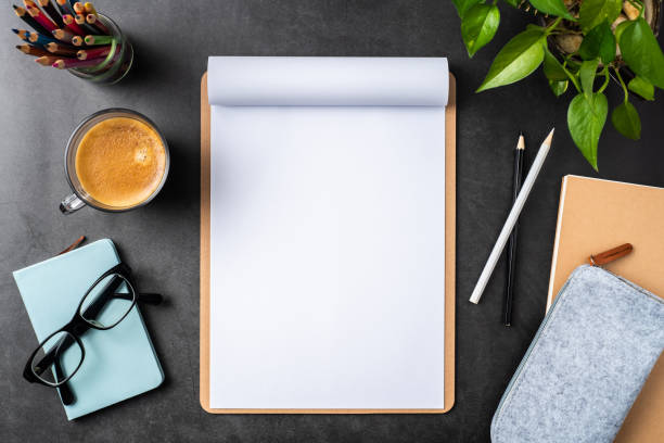 istock white paper with clipboard on black background 1144145025