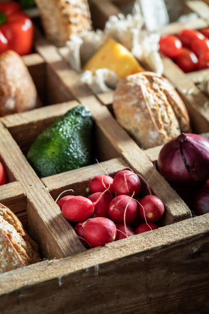 istock Tasty ingredients for sandwich with vegetables, cheese and herbs 1144145300
