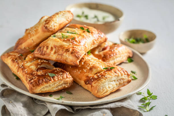 istock Crispy sausage roll with thyme and sesame seeds 1144146306