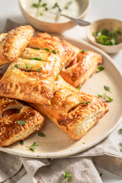 istock Fresh sausage roll with tatar sauce and herbs 1144146406