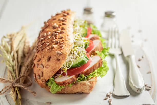 istock Homemade sandwich with roasted chicken, lettuce and tomato 1144146759