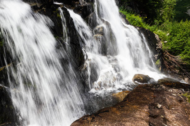 istock Vertical waterfall in rocks. Mountain river in mountains. 1144148022