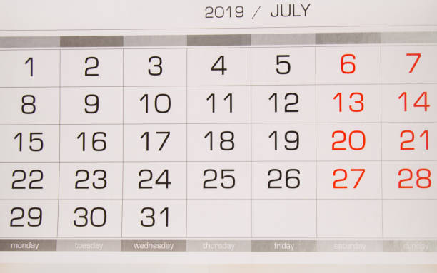 istock Calendar July 2019 with working days and weekends, close-up top view 1144148853