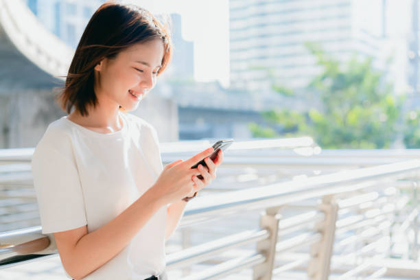 istock Woman using smartphone, During leisure time. The concept of using the phone is essential in everyday life. 1144149120