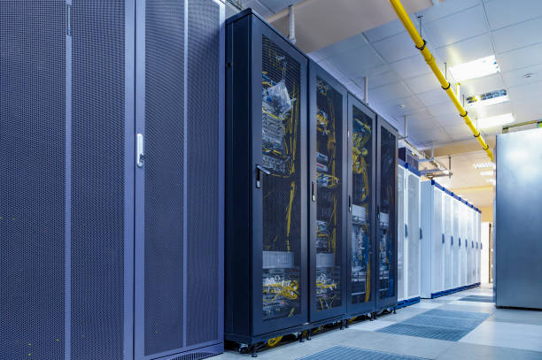 Server internet datacenter room with rows of modern mainframes. Server control center for internet provider. Network and technology concept. stock photo