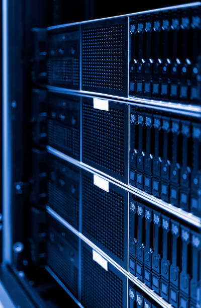 istock Close up view of modern computer server in dark tinting design. Networking, big data centre and high technology concept. Dept of field, selective focus 1144149573