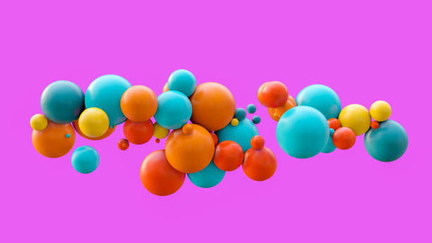 istock Flying spheres isolated on pink background 1144150735