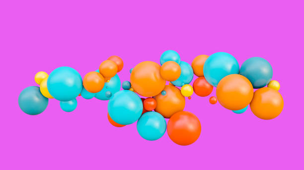 istock Flying spheres isolated on pink background 1144150745