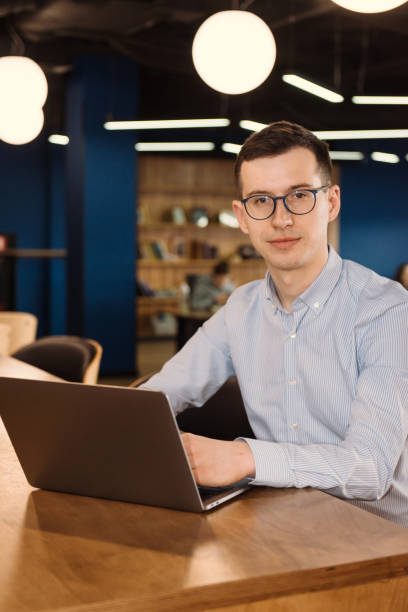 istock Business man in glasses at the office 1144153148