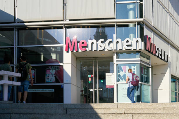 Entrance to the Menschen Museum in Berlin Berlin, Germany – June 07, 2018: Entrance to the Menschen Museum by Gunther von Hagens at Alexanderplatz in Berlin. The museum is very controversial because preserved dead people are exhibited in it. plastination photos stock pictures, royalty-free photos & images