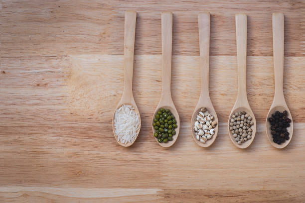 istock Grains placed on 5 spoons  place on wood table 1144156228