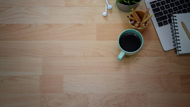 istock Top view wood desk and copy space 1144156671