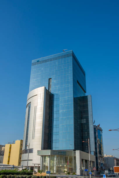 istock Modern rectangular building with glassed facade at the street 1144156743
