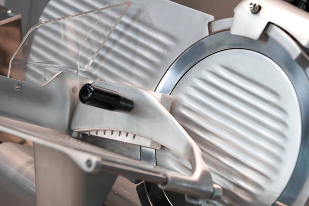 istock Industrial machine for cutting meat and meat 1144157505