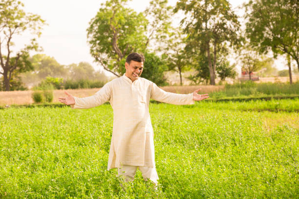 istock Indian farmer at field - Stock image 1144157557