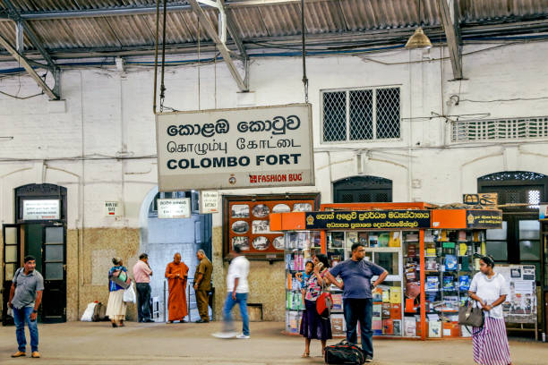 busy train station in Colombo Colombo, Sri Lanka - March 04, 2019: People waiting for train at busy train station in Colombo colombo train stock pictures, royalty-free photos & images