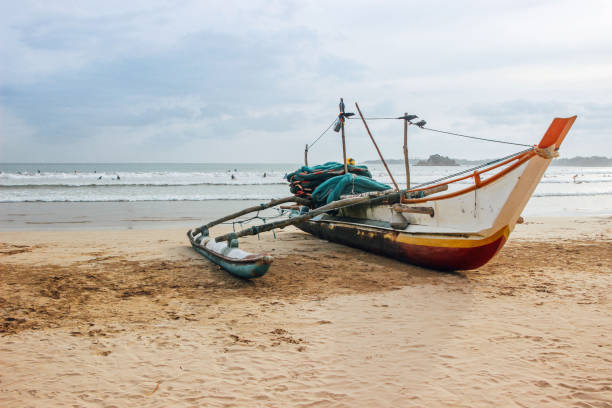 istock fishing boat on beach in sri lanka 1144158104