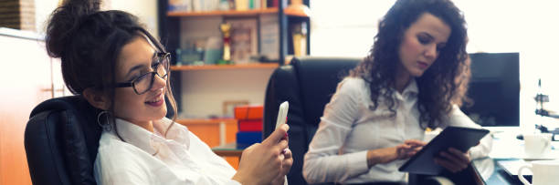 istock Two businesswomen working in the office 1144158995