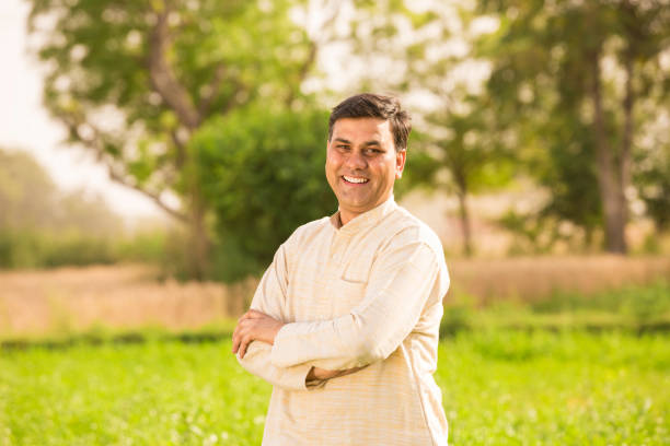 istock Indian farmer at field - Stock image 1144159484