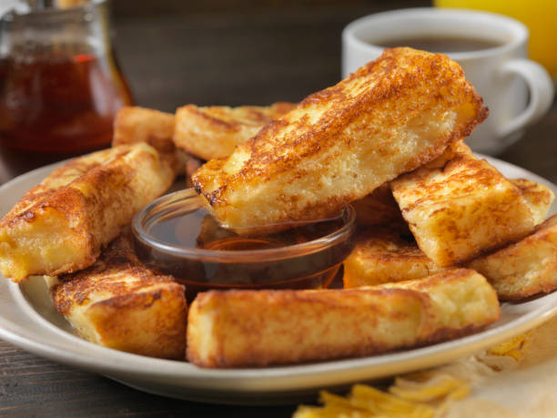 Crispy French Toast Fingers with Maple Syrup Crispy French Toast Fingers with Maple Syrup french toast stock pictures, royalty-free photos & images