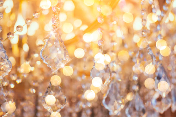 istock blur and defocus crystal chadelier shiny glitter abstract background 1144159867