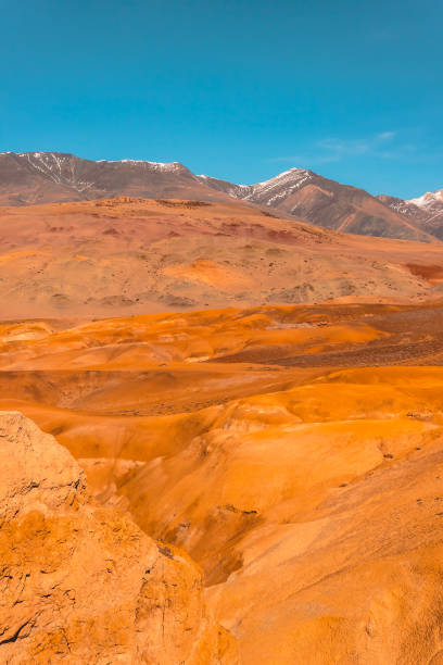 istock Yellow and red rocks under blue sky. Desert landscape with mountains. 1144160600