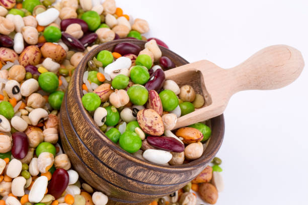 istock Mixed dried legumes and cereals isolated on white background, top view 1144160662