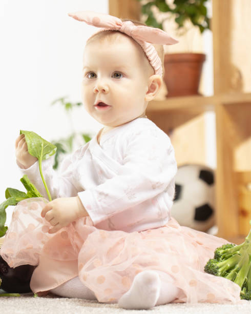 Small female child with spinach