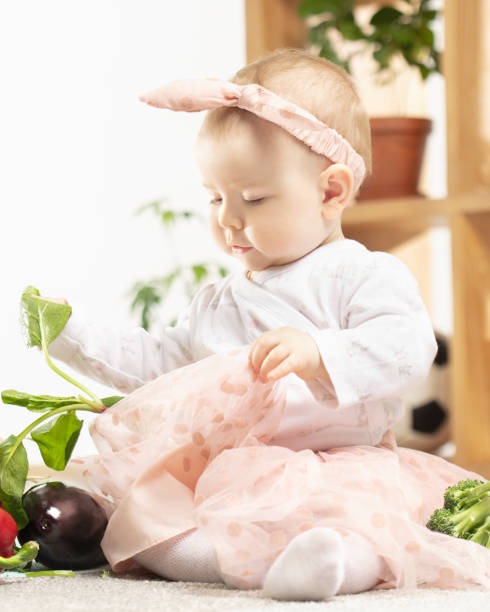 Small female child with spinach