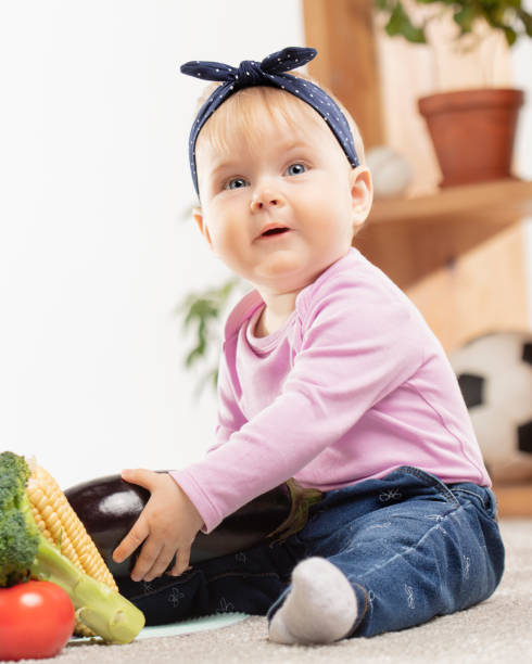 Small female child with eggplant