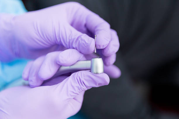 istock Dentist holding dental burs 1144164668