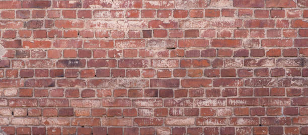 istock Old red brick vintage stonewall background for text or image. 1144166705