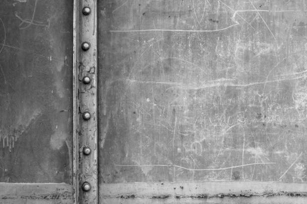 istock Abstract background back and white steel sheet with rust,Train wall old and rusted 1144170401