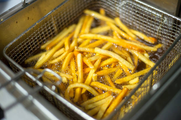 istock Cooking french fries 1144170897