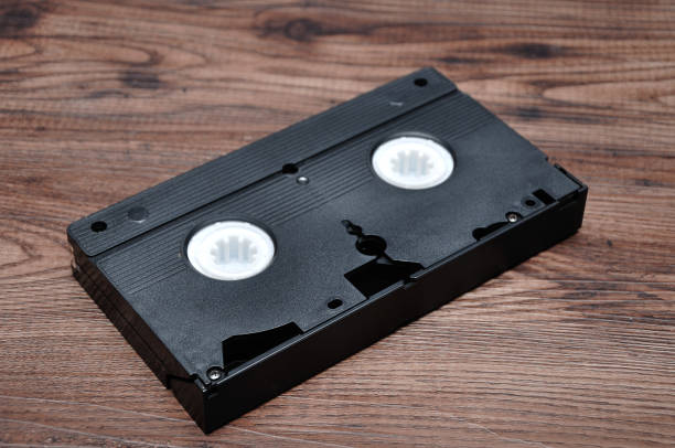 istock A video cassette isolated on a wooden background 1144172780