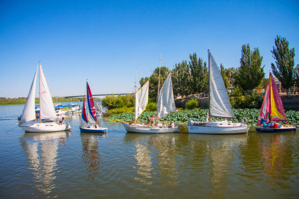 Astrakhan, Russia - August 31 2014: Sailing boats in the summer on the Volga River