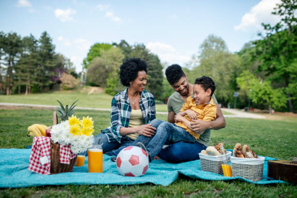 istock Happy family spending a spring day on picnic 1144175891