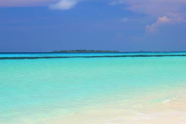 istock turquoise lagoon of Maldives 1144184583