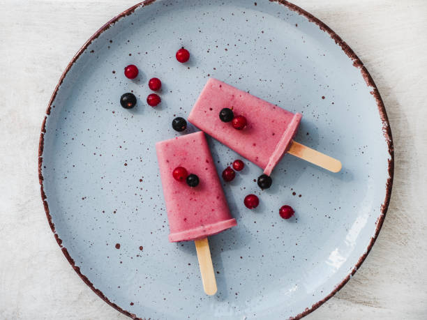istock Pink fruit ice cream on a vintage plate 1144185499