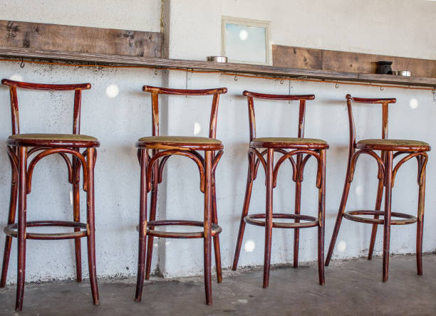istock Wooden bar chairs. Wooden stools 1144187831