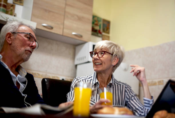 istock Senior couple in kitchen. 1144187886