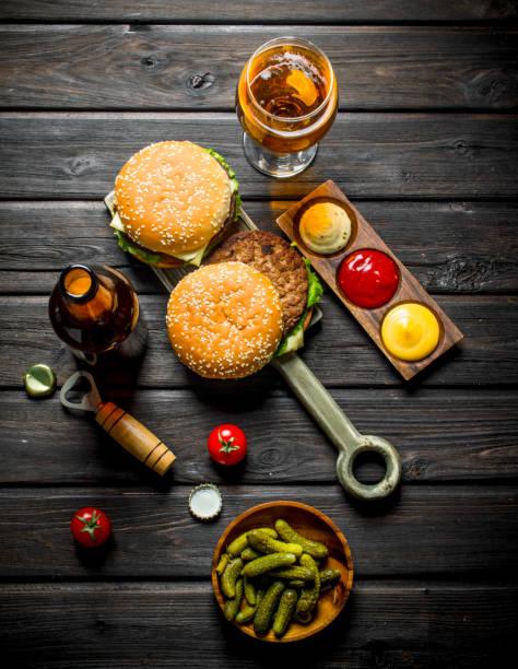 istock Burgers with beer,gherkins and sauces. 1144190508