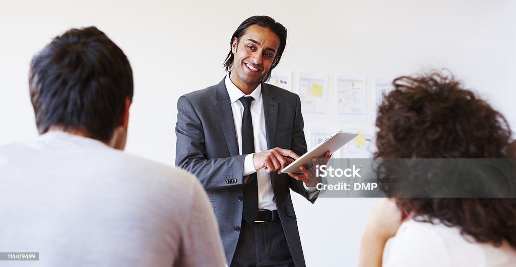 Geschäftsmann mit einem Tablet-Computer - Lizenzfrei Anzug Stock-Foto