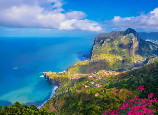 Aerial view over Faial city fort and Santana region on the ocean coast of Madeira island, Portugal