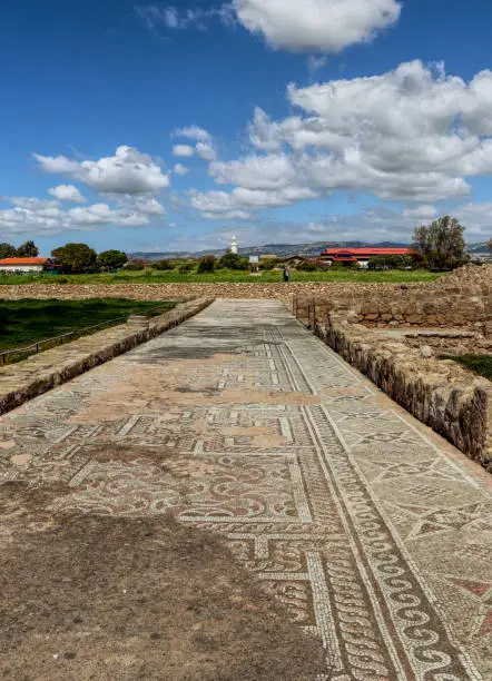 Rome pavement made of mosaic in Kato Paphos Archaeological Park, Cyprus. Prehistoric road in Governor of Rome´s house. Hand decorated path. History of Rome.