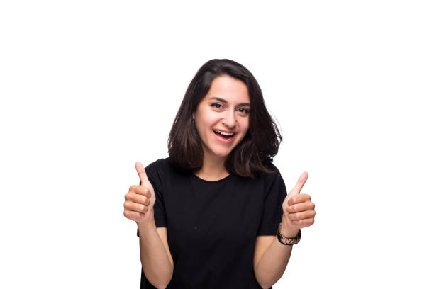 istock Young Beautiful Girl Doing Different Facial Expressions İn Front White Background 1144201059