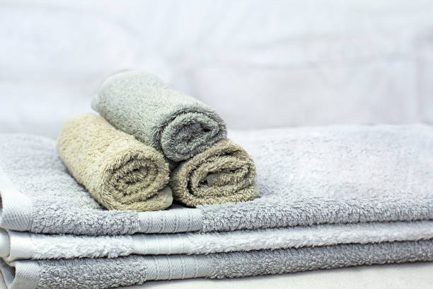 istock Stack of bath towels on background closeup 1144202858