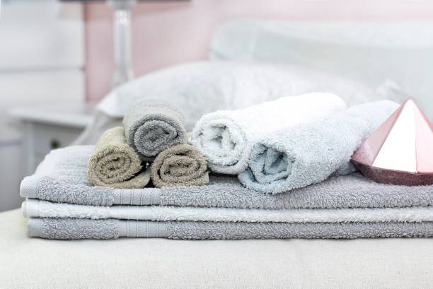 istock Stack of bath towels on background closeup 1144202868