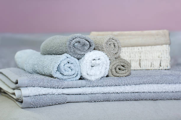 istock Stack of bath towels on background closeup 1144203431